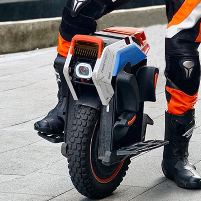Inmotion electric unicycle with rider in gear